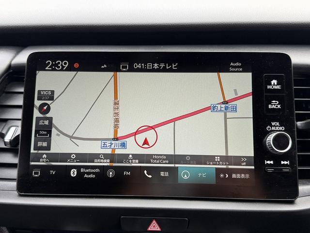 フィット ｅ：ＨＥＶリュクス　フルセグナビ・Ｓ＆Ｂカメラ・ＢＴオーディオ・ＬＥＤライト・ＡＣＣ・ＬＫＡ・ＡＨＢ・Ｃソナー・ハーフレザー・本革ステア・ミラーウィンカー・ドアバイザー・ＥＴＣ２．０・スマキー・１６ＡＷ（14枚目）