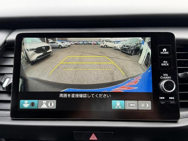 フィット ｅ：ＨＥＶリュクス　フルセグナビ・Ｓ＆Ｂカメラ・ＢＴオーディオ・ＬＥＤライト・ＡＣＣ・ＬＫＡ・ＡＨＢ・Ｃソナー・ハーフレザー・本革ステア・ミラーウィンカー・ドアバイザー・ＥＴＣ２．０・スマキー・１６ＡＷ（15枚目）