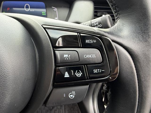 フィット ｅ：ＨＥＶリュクス　フルセグナビ・Ｓ＆Ｂカメラ・ＢＴオーディオ・ＬＥＤライト・ＡＣＣ・ＬＫＡ・ＡＨＢ・Ｃソナー・ハーフレザー・本革ステア・ミラーウィンカー・ドアバイザー・ＥＴＣ２．０・スマキー・１６ＡＷ（28枚目）