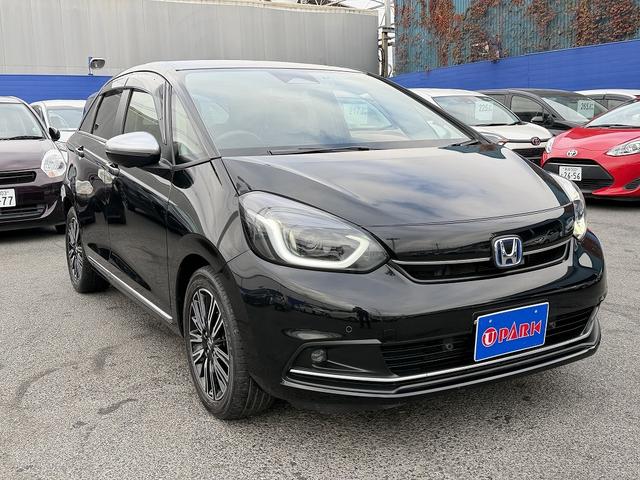 フィット ｅ：ＨＥＶリュクス　フルセグナビ・Ｓ＆Ｂカメラ・ＢＴオーディオ・ＬＥＤライト・ＡＣＣ・ＬＫＡ・ＡＨＢ・Ｃソナー・ハーフレザー・本革ステア・ミラーウィンカー・ドアバイザー・ＥＴＣ２．０・スマキー・１６ＡＷ（33枚目）