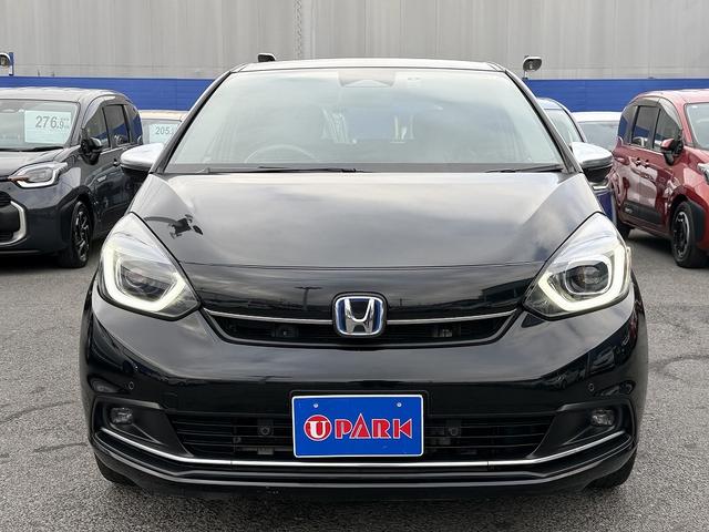 フィット ｅ：ＨＥＶリュクス　フルセグナビ・Ｓ＆Ｂカメラ・ＢＴオーディオ・ＬＥＤライト・ＡＣＣ・ＬＫＡ・ＡＨＢ・Ｃソナー・ハーフレザー・本革ステア・ミラーウィンカー・ドアバイザー・ＥＴＣ２．０・スマキー・１６ＡＷ（34枚目）