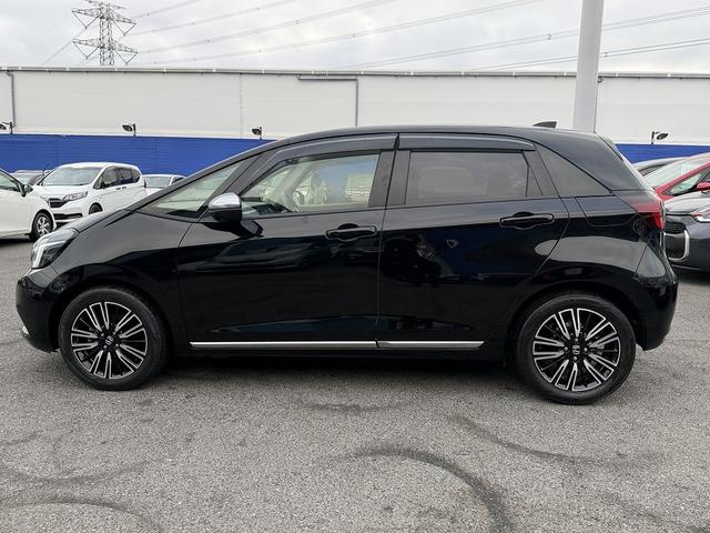 フィット ｅ：ＨＥＶリュクス　フルセグナビ・Ｓ＆Ｂカメラ・ＢＴオーディオ・ＬＥＤライト・ＡＣＣ・ＬＫＡ・ＡＨＢ・Ｃソナー・ハーフレザー・本革ステア・ミラーウィンカー・ドアバイザー・ＥＴＣ２．０・スマキー・１６ＡＷ（36枚目）