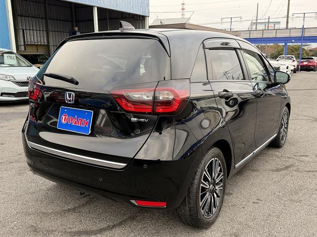 フィット ｅ：ＨＥＶリュクス　フルセグナビ・Ｓ＆Ｂカメラ・ＢＴオーディオ・ＬＥＤライト・ＡＣＣ・ＬＫＡ・ＡＨＢ・Ｃソナー・ハーフレザー・本革ステア・ミラーウィンカー・ドアバイザー・ＥＴＣ２．０・スマキー・１６ＡＷ（39枚目）