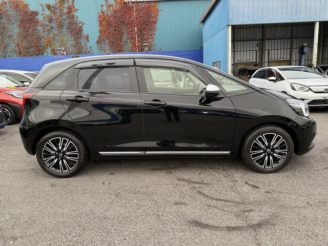 フィット ｅ：ＨＥＶリュクス　フルセグナビ・Ｓ＆Ｂカメラ・ＢＴオーディオ・ＬＥＤライト・ＡＣＣ・ＬＫＡ・ＡＨＢ・Ｃソナー・ハーフレザー・本革ステア・ミラーウィンカー・ドアバイザー・ＥＴＣ２．０・スマキー・１６ＡＷ（40枚目）