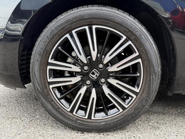 フィット ｅ：ＨＥＶリュクス　フルセグナビ・Ｓ＆Ｂカメラ・ＢＴオーディオ・ＬＥＤライト・ＡＣＣ・ＬＫＡ・ＡＨＢ・Ｃソナー・ハーフレザー・本革ステア・ミラーウィンカー・ドアバイザー・ＥＴＣ２．０・スマキー・１６ＡＷ（49枚目）