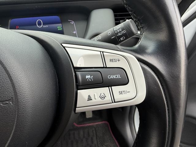 フィット ｅ：ＨＥＶホーム　ホンダＳ・フルセグナビ・Ｂカメラ・ＢＴオーディオ・ＬＥＤライト・ＡＣＣ・ＬＫＡ・ＡＨＢ・Ｃソナー・ＥＴＣ・ハーフレザー・本革ステア・ミラーウィンカー・ＵＳＢ・ドアバイザー・プライバシーガラス・記録簿（15枚目）