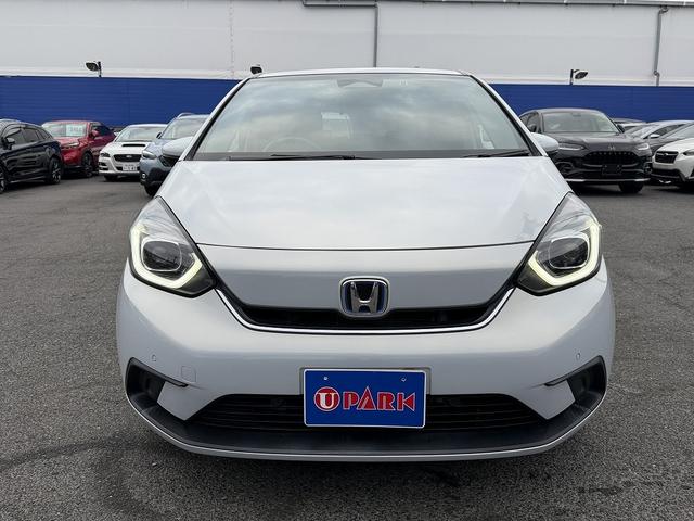 フィット ｅ：ＨＥＶホーム　ホンダＳ・フルセグナビ・Ｂカメラ・ＢＴオーディオ・ＬＥＤライト・ＡＣＣ・ＬＫＡ・ＡＨＢ・Ｃソナー・ＥＴＣ・ハーフレザー・本革ステア・ミラーウィンカー・ＵＳＢ・ドアバイザー・プライバシーガラス・記録簿（22枚目）