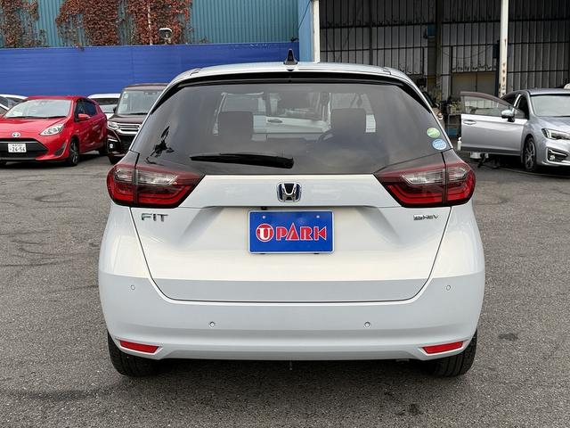 フィット ｅ：ＨＥＶホーム　ホンダＳ・フルセグナビ・Ｂカメラ・ＢＴオーディオ・ＬＥＤライト・ＡＣＣ・ＬＫＡ・ＡＨＢ・Ｃソナー・ＥＴＣ・ハーフレザー・本革ステア・ミラーウィンカー・ＵＳＢ・ドアバイザー・プライバシーガラス・記録簿（26枚目）