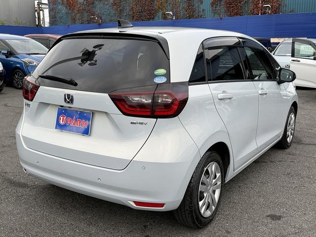 フィット ｅ：ＨＥＶホーム　ホンダＳ・フルセグナビ・Ｂカメラ・ＢＴオーディオ・ＬＥＤライト・ＡＣＣ・ＬＫＡ・ＡＨＢ・Ｃソナー・ＥＴＣ・ハーフレザー・本革ステア・ミラーウィンカー・ＵＳＢ・ドアバイザー・プライバシーガラス・記録簿（27枚目）