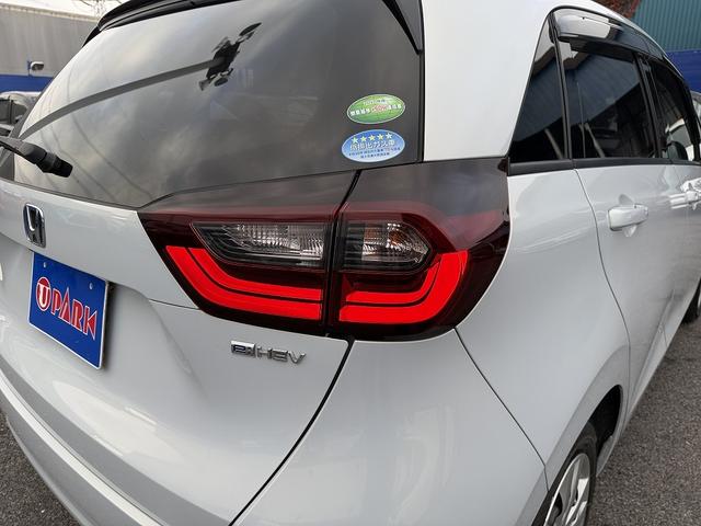 フィット ｅ：ＨＥＶホーム　ホンダＳ・フルセグナビ・Ｂカメラ・ＢＴオーディオ・ＬＥＤライト・ＡＣＣ・ＬＫＡ・ＡＨＢ・Ｃソナー・ＥＴＣ・ハーフレザー・本革ステア・ミラーウィンカー・ＵＳＢ・ドアバイザー・プライバシーガラス・記録簿（32枚目）