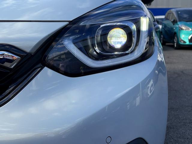 フィット e:HEVホーム ホンダセンシング・純正ナビ・バックカメラ・ETC・CD・BTオーディオ・USB・LEDヘッドライト・AUTOハイビーム・Cソナー・革ステア・ハーフレザー・フロアマット・ドアバイザー(37枚目)