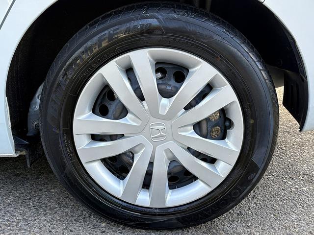 フィット e:HEVホーム ホンダセンシング・純正ナビ・バックカメラ・ETC・CD・BTオーディオ・USB・LEDヘッドライト・AUTOハイビーム・Cソナー・革ステア・ハーフレザー・フロアマット・ドアバイザー(49枚目)