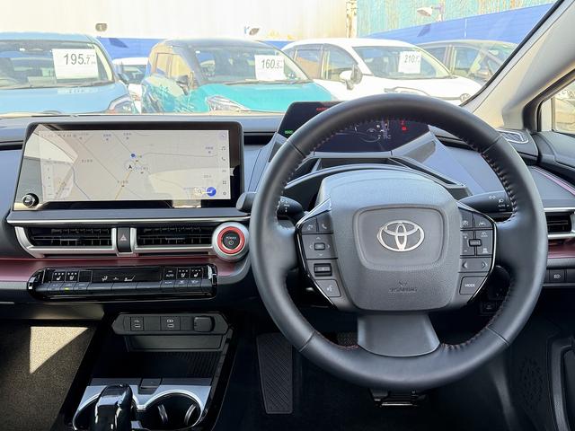 プリウス Z セーフティセンス・12.3型フルセグナビ・全周囲カメラ・BTオーディオ・Carplay・ETC2.0・ステアヒーター・Cソナー・BSM・RCTA・パーキングアシスト・AC100V電源・純正19AW(25枚目)