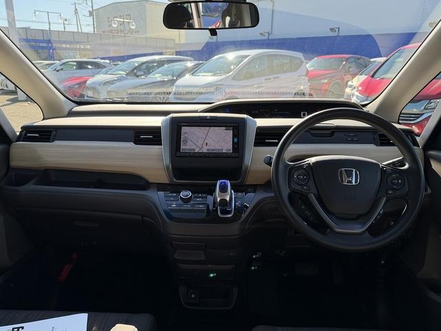 フリードハイブリッド ハイブリッド・Ｇホンダセンシング　１オーナー・ホンダセンシング・両側パワースライド・フルセグナビ・ＥＴＣ・バックカメラ・ＢＴオーディオ・ＬＥＤヘッドライト・ＡＵＴＯライト・スマートキー・ドアバイザー・フロアマット（5枚目）