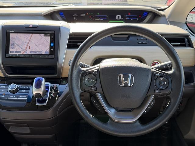 フリードハイブリッド ハイブリッド・Ｇホンダセンシング　１オーナー・ホンダセンシング・両側パワースライド・フルセグナビ・ＥＴＣ・バックカメラ・ＢＴオーディオ・ＬＥＤヘッドライト・ＡＵＴＯライト・スマートキー・ドアバイザー・フロアマット（6枚目）