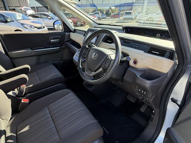 フリードハイブリッド ハイブリッド・Ｇホンダセンシング　１オーナー・ホンダセンシング・両側パワースライド・フルセグナビ・ＥＴＣ・バックカメラ・ＢＴオーディオ・ＬＥＤヘッドライト・ＡＵＴＯライト・スマートキー・ドアバイザー・フロアマット（7枚目）