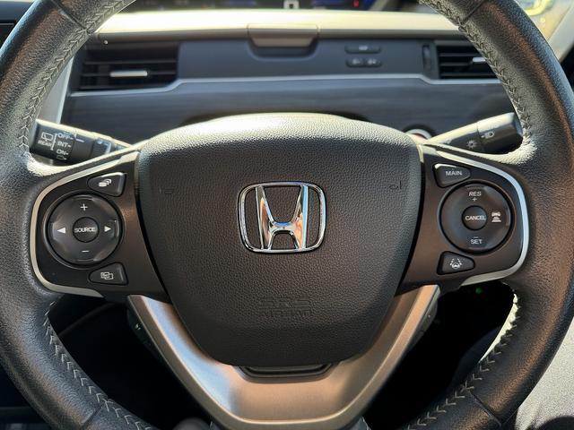 フリード+ハイブリッド ハイブリッドEX 両Pスライド・フルセグナビ・Bカメラ・BTオーディオ・ACC・LKA・LEDライト・ハーフレザー・シートヒーター・ETC・本革ステア・ミラーウィンカー・プライバシーガラス・ドアバイザー(19枚目)