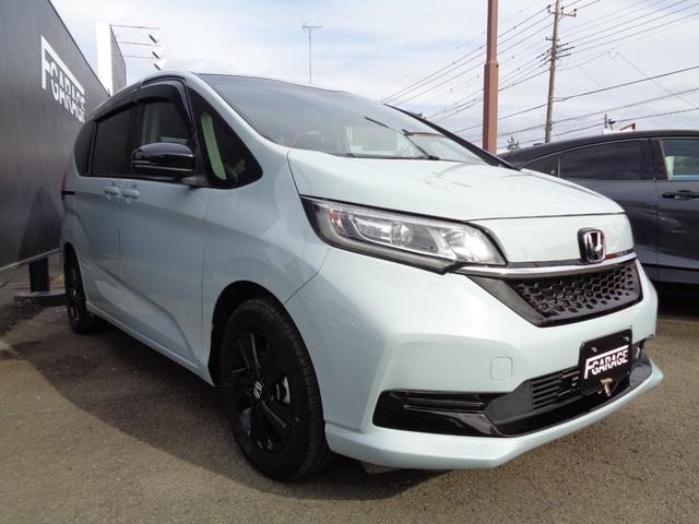 フリードハイブリッド ハイブリッド・Gブラックスタイル 純正ナビ Bluetooth バックモニター ビルトインETC 前後ドライブレコーダー スマートキー プッシュスタート シートヒーター 両側パワースライドドア LEDヘッドライト アルミホイール(3枚目)