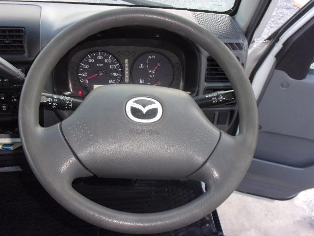 ブローニィバン ロングＤＸ　前後同タイヤ　リアシングルタイヤ　前後バンパーラプター塗装　５ドア　６人　ＡＴ　タイヤ４本新品　ＥＴＣ　プライバシーガラス　荷室ハンガーバー付　集中ドア　ＡＣ　エアバック　ＰＳ　ＰＷ　積載１２５０ｋｇ（30枚目）