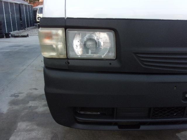 ブローニィバン ロングＤＸ　前後同タイヤ　リアシングルタイヤ　前後バンパーラプター塗装　５ドア　６人　ＡＴ　タイヤ４本新品　ＥＴＣ　プライバシーガラス　荷室ハンガーバー付　集中ドア　ＡＣ　エアバック　ＰＳ　ＰＷ　積載１２５０ｋｇ（38枚目）