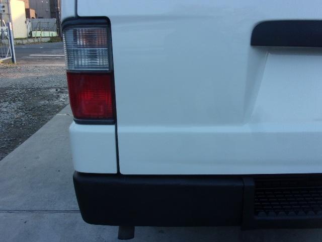 ブローニィバン ロングＤＸ　前後同タイヤ　リアシングルタイヤ　前後バンパーラプター塗装　５ドア　６人　ＡＴ　タイヤ４本新品　ＥＴＣ　プライバシーガラス　荷室ハンガーバー付　集中ドア　ＡＣ　エアバック　ＰＳ　ＰＷ　積載１２５０ｋｇ（41枚目）