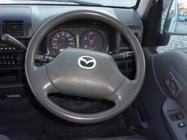 ブローニィバン ロングＤＸ　平床　荷室アオリ付　タイミングベルト交換済　ＡＴ　５Ｄ　６人乗り　リアサイドパネル付　ＡＣ　エアバック　運転席助手席のみ集中ドア　エアバック　ＰＳ　ＰＷ　積載１２５０ｋｇ（34枚目）