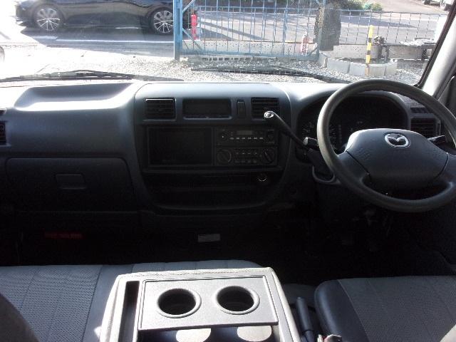 ブローニィバン ロングＤＸ　平床　リアＷタイヤ　ＡＴ　前後バンパーラプター塗装　５ドア　３人乗り　６人乗り構造変更可能　プライバシーガラス　ＡＣ　エアバック　ＰＳ　ＰＷ　集中ドアロック　積載１２５０ｋｇ（11枚目）