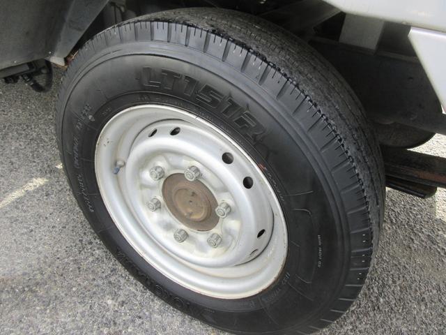 アトラストラック WキャブショートフルスーパーローDX Wキャブ 三方開き シングルタイヤ オートマ ABS D席エアバック 集中ドア キーレス ETC 左側電動格納ミラー 荷台板張り 1150Kg積載(26枚目)