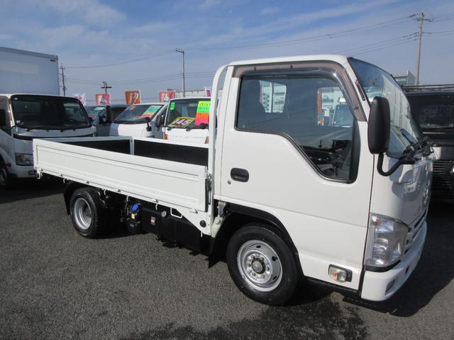 タイタントラック ワイドロー ワイドロー 低床 Wタイヤ 三方開き オートマ ABS Wエアバッグ 集中ドア キーレス ETC 左側電動格納ミラー アイドリングストップ 社外ナビTV 荷台床鉄板張り 2000Kg積載(6枚目)