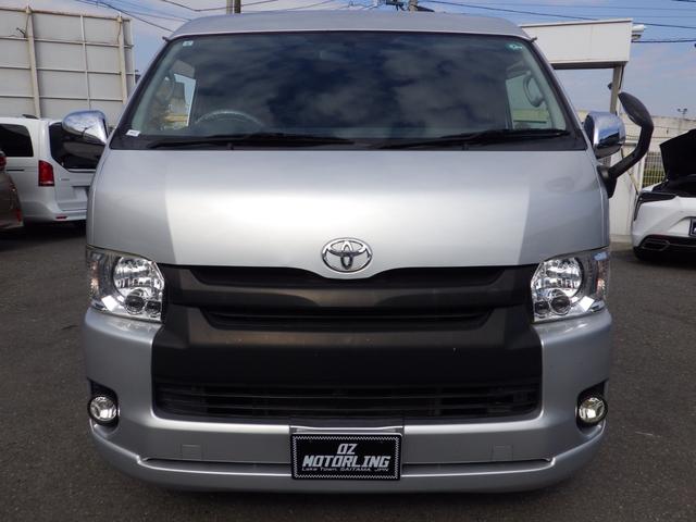 ハイエースバン ロングスーパーGL 4WD Bluetooth対応ナビ 玄武ローダウン 社外16インチアルミ ベッドキット センターテーブル 黒革調シートカバー 両側パワスラ 助手席エアバッグ 禁煙車 OBD診断済み 鑑定書付き(9枚目)