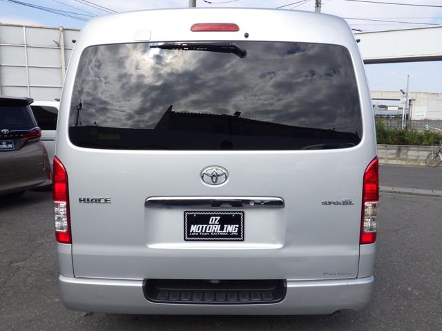 ハイエースバン ロングスーパーGL 4WD Bluetooth対応ナビ 玄武ローダウン 社外16インチアルミ ベッドキット センターテーブル 黒革調シートカバー 両側パワスラ 助手席エアバッグ 禁煙車 OBD診断済み 鑑定書付き(12枚目)