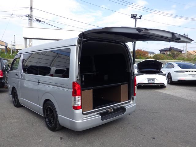 ハイエースバン ロングスーパーGL 4WD Bluetooth対応ナビ 玄武ローダウン 社外16インチアルミ ベッドキット センターテーブル 黒革調シートカバー 両側パワスラ 助手席エアバッグ 禁煙車 OBD診断済み 鑑定書付き(13枚目)