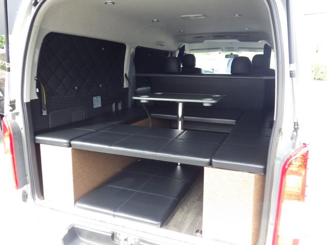 ハイエースバン ロングスーパーGL 4WD Bluetooth対応ナビ 玄武ローダウン 社外16インチアルミ ベッドキット センターテーブル 黒革調シートカバー 両側パワスラ 助手席エアバッグ 禁煙車 OBD診断済み 鑑定書付き(15枚目)