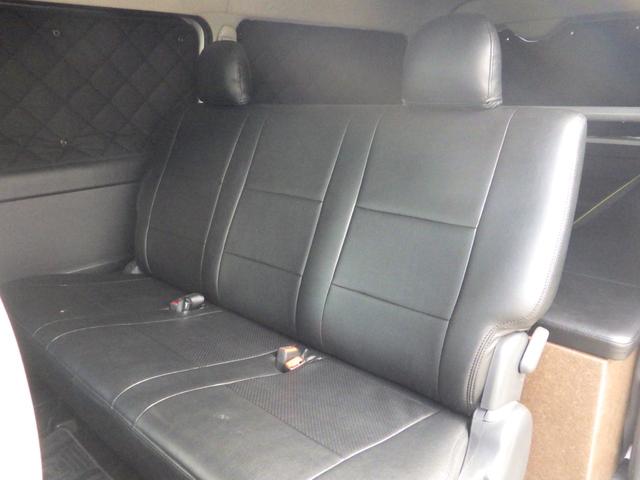 ハイエースバン ロングスーパーGL 4WD Bluetooth対応ナビ 玄武ローダウン 社外16インチアルミ ベッドキット センターテーブル 黒革調シートカバー 両側パワスラ 助手席エアバッグ 禁煙車 OBD診断済み 鑑定書付き(25枚目)