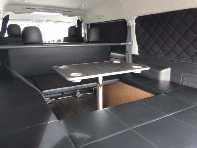ハイエースバン ロングスーパーGL 4WD Bluetooth対応ナビ 玄武ローダウン 社外16インチアルミ ベッドキット センターテーブル 黒革調シートカバー 両側パワスラ 助手席エアバッグ 禁煙車 OBD診断済み 鑑定書付き(26枚目)