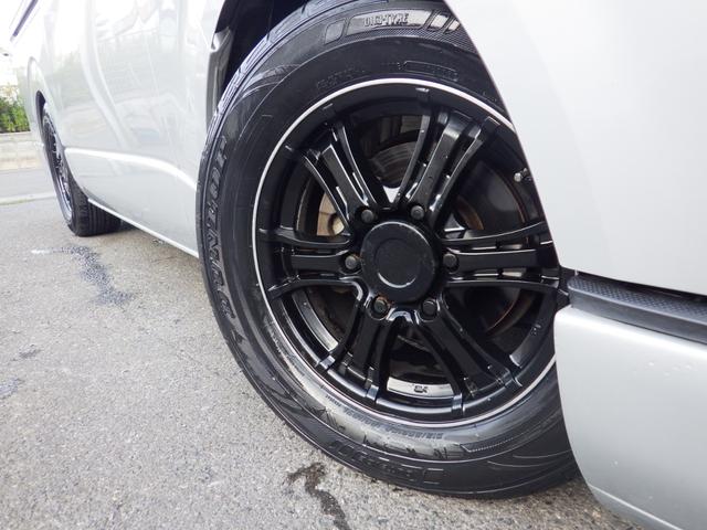 ハイエースバン ロングスーパーGL 4WD Bluetooth対応ナビ 玄武ローダウン 社外16インチアルミ ベッドキット センターテーブル 黒革調シートカバー 両側パワスラ 助手席エアバッグ 禁煙車 OBD診断済み 鑑定書付き(28枚目)