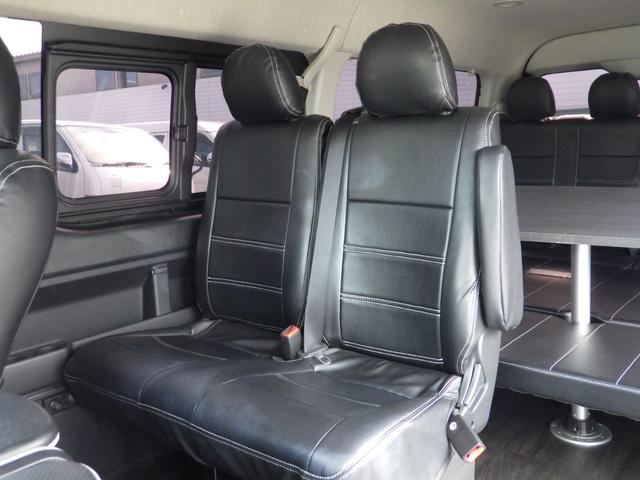 ハイエースワゴン ＧＬ　Ｂｌｕｅｔｏｏｔｈ対応ナビ　フリップダウンモニター　ブロックローダウン　バルベロ１７インチアルミ　ベッドキット　センターテーブル　黒革調シートカバー　ワンオーナー　１０人乗り　ＯＢＤ診断済　鑑定書付き（25枚目）