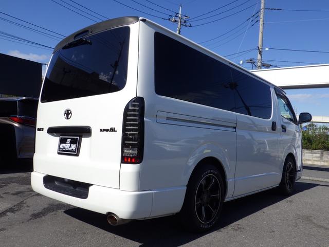 ハイエースバン スーパーGL ダークプライム Bluetooth対応ALPINEナビ/フリップダウンモニター ベッドキット バッドフェイス 玄武ローダウン エムテクノ減衰力調整式ショック MTS17インチアルミ OBD診断済み グー鑑定書付き(14枚目)