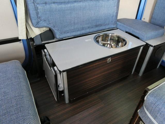 ＮＶ２００バネットバン 　キャンピングカー広島製　ポップ・コン　ポップアップルーフ・サブバッテリー・ＦＦヒーター・走行充電・外部入力電源・インバーター・シンク・コンロ・テーブル・ＳＤナビＢカメラ・ＰＯＰ．ＣＯＭ　キャンパーＲ（25枚目）