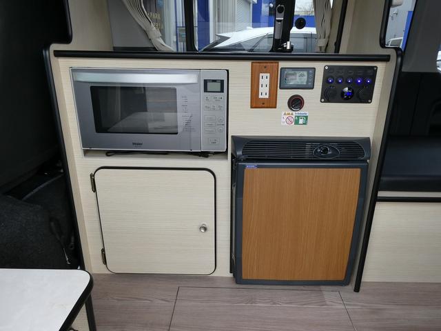 ハイエースバン ロングDX グリーンハンズ製 HAJIME リチウムバッテリー・電圧計・2000Wインバーター・外部電源・12Vクーラー・FFヒーター・走行時リアクーラー&ヒーター・シンク・40L冷蔵庫・9インチナビ・Bカメラ(16枚目)