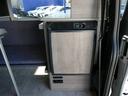 スーパーGL ダークプライムII インディアンキャンパー製アパッチ・サブバッテリー×2・2段ベッド・1500Wインバーター・電子レンジ・走行充電・40L冷蔵庫・シンク・10L給排水タンク・テーブル・アルパインナビフリップダウンモニター(24枚目)