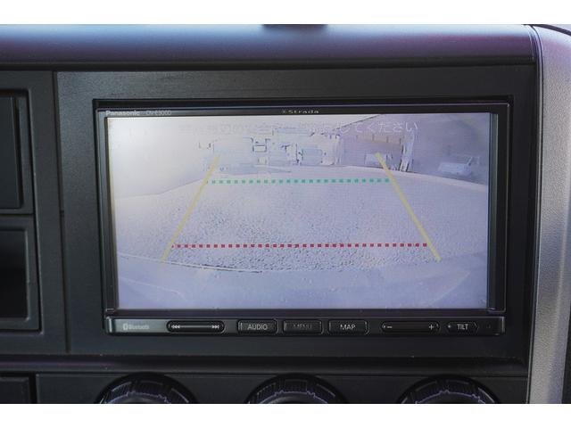 キャンター 高所作業車　アイチ製ＳＢ１０Ａ　最大地上高９．７ｍ　通信工事　ＦＲＰバケット　バケット積載荷重２００ｋｇ　積載２５０ｋｇ　工具入れ　ジョイスティックタイプ　アワーメーター３３００ｈ　左電格ミラー　社外ナビ　バックカメラ　ＥＴＣ　フォグランプ（11枚目）