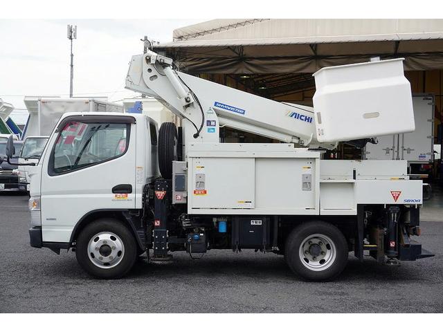 キャンター 高所作業車　アイチ製ＳＢ１０Ａ　最大地上高９．７ｍ　通信工事　ＦＲＰバケット　バケット積載荷重２００ｋｇ　積載２５０ｋｇ　工具入れ　ジョイスティックタイプ　アワーメーター１８０６ｈ　左電格ミラー　バックカメラ　フォグランプ（6枚目）