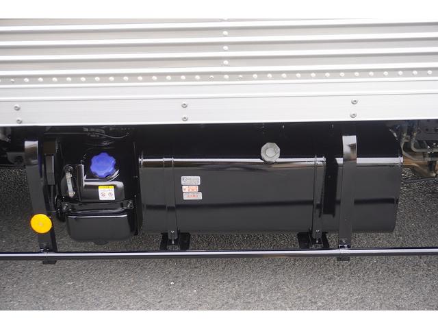 エルフトラック ワイドロング　アルミバン　２トン積　手動跳上パワーゲート　積載２０００ｋｇ　ラッシング３段　導風板　高箱　左電格ミラー　バックカメラ　ナビ　ＥＴＣ２．０　フォグランプ　日本フルハーフ製　ＡＴ（25枚目）