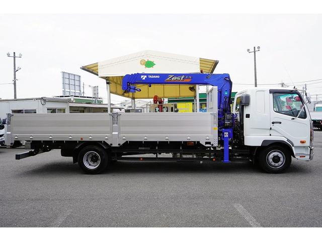 ファイター 増トン　ワイド　ベッド付　４段クレーン　６ｍ長　ラジコン　積載７５００ｋｇ　タダノ製　アルミブロック　五方開　ラジコン　フックイン　２．９３ｔ吊　角足　差違いアウトリガー　坂道発進補助　ＥＴＣ２．０　メッキ　オートエアコン　リーフサス　６速ＭＴ（5枚目）