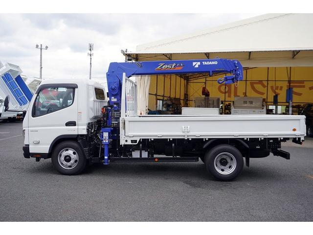 キャンター ワイドロング 4段クレーン 3.35t ラジコン 2.9t吊 積載3350kg タダノ製 フックイン バックカメラ ETC 坂道発進補助 左電格ミラー LEDヘッドライト フォグランプ スマートキー 衝突軽減ブレーキ 車線逸脱警報 5速MT(4枚目)