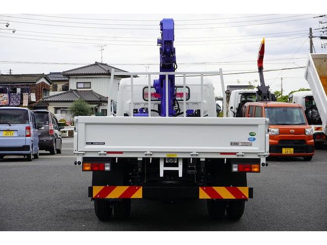 キャンター ワイドロング 4段クレーン 3.35t ラジコン 2.9t吊 積載3350kg タダノ製 フックイン バックカメラ ETC 坂道発進補助 左電格ミラー LEDヘッドライト フォグランプ スマートキー 衝突軽減ブレーキ 車線逸脱警報 5速MT(5枚目)