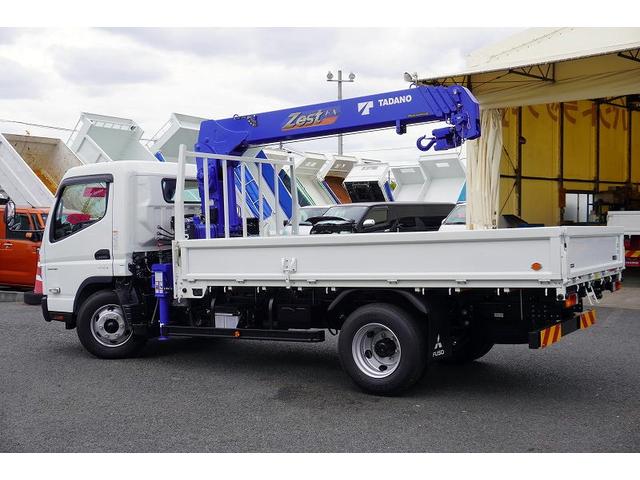 キャンター ワイドロング 4段クレーン 3.35t ラジコン 2.9t吊 積載3350kg タダノ製 フックイン バックカメラ ETC 坂道発進補助 左電格ミラー LEDヘッドライト フォグランプ スマートキー 衝突軽減ブレーキ 車線逸脱警報 5速MT(7枚目)