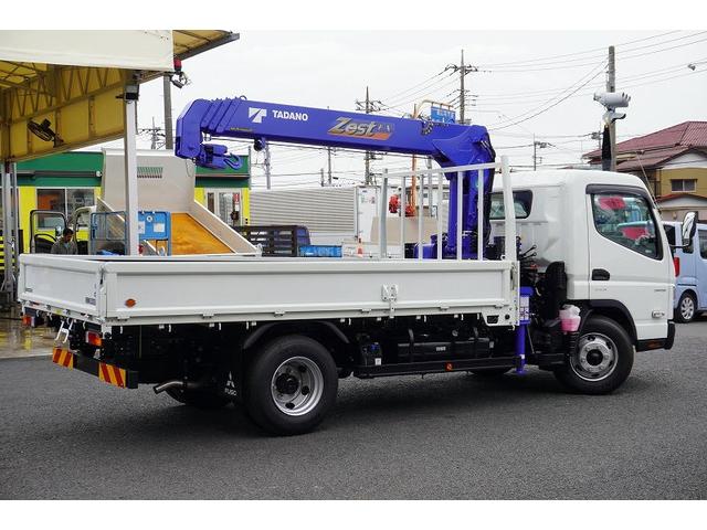 キャンター ワイドロング 4段クレーン 3.35t ラジコン 2.9t吊 積載3350kg タダノ製 フックイン バックカメラ ETC 坂道発進補助 左電格ミラー LEDヘッドライト フォグランプ スマートキー 衝突軽減ブレーキ 車線逸脱警報 5速MT(8枚目)