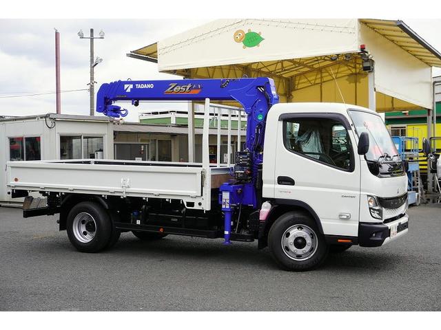 キャンター ワイドロング 4段クレーン 3.35t ラジコン 2.9t吊 積載3350kg タダノ製 フックイン バックカメラ ETC 坂道発進補助 左電格ミラー LEDヘッドライト フォグランプ スマートキー 衝突軽減ブレーキ 車線逸脱警報 5速MT(9枚目)